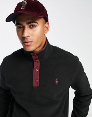 Polo Ralph Lauren icon logo contrast placket half popper sweatshirt in black - ASOS Price Checker