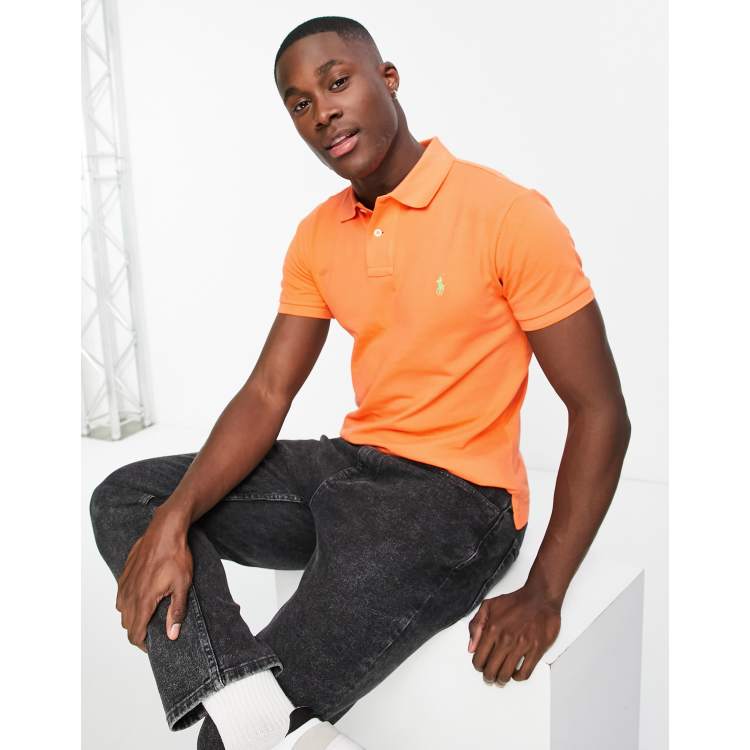 Polo Ralph Lauren icon logo slim fit pique polo in orange | ASOS