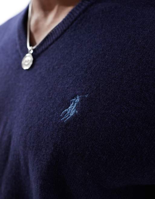 Blue polo v neck on sale