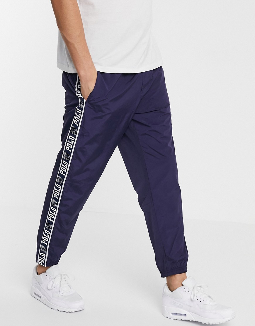 Polo Ralph Lauren - Joggers rivestiti blu navy con nastro laterale con logo