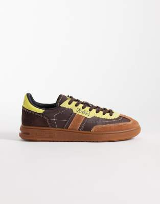  lace up trainers in brown and yellow