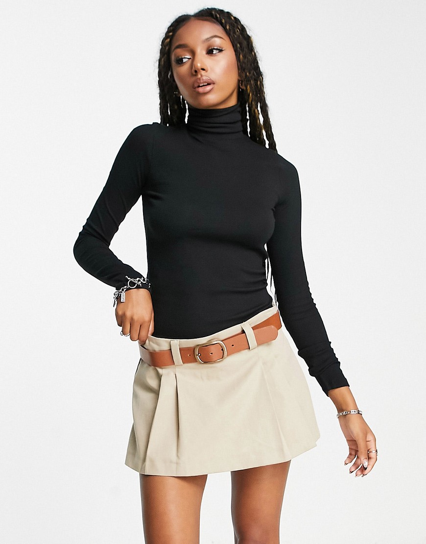 Shop Polo Ralph Lauren Long Sleeve Jersey Knit Roll Neck Top In Black