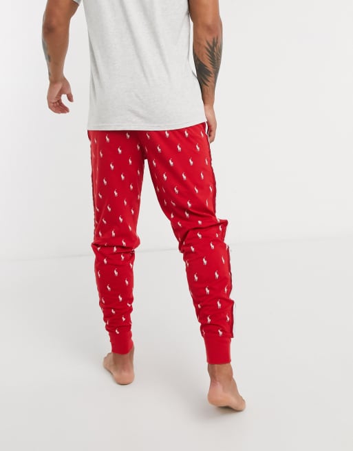 Polo Ralph Lauren loungewear cuffed sweatpants with side stripe and all  over polo player logo in red