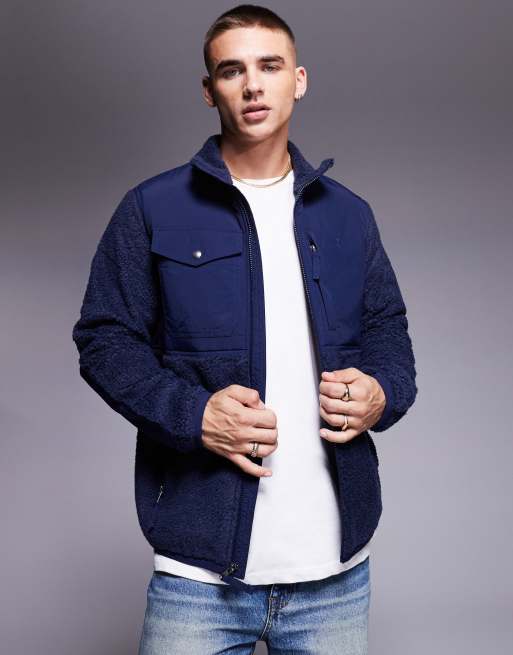 Polo Ralph Lauren – Marinblå hybridjacka i teddy med ikonlogga