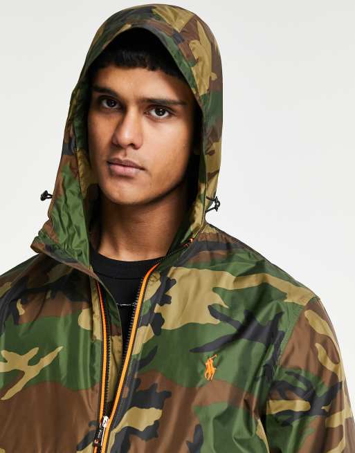 Polo Ralph Lauren nylon plainweave Belport player logo camo print hooded  rain jacket in green/black | ASOS