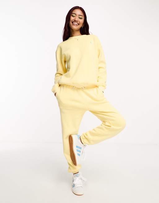 Ensemble jogging best sale jaune femme