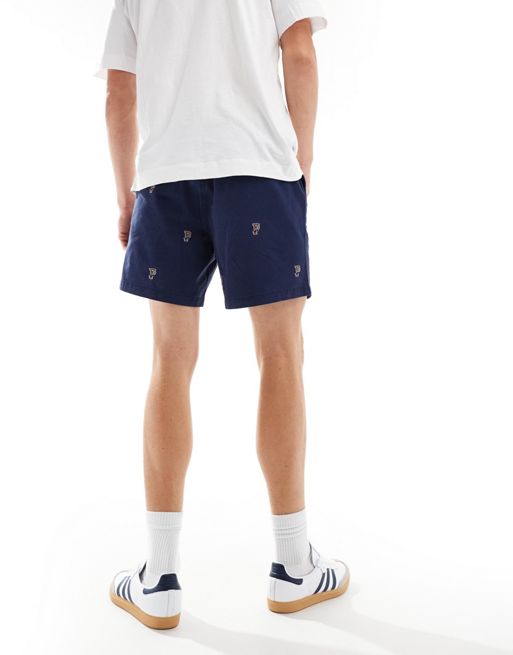 Polo Ralph Lauren Prepsters all over retro sports logo print flat front  twill chino shorts in navy