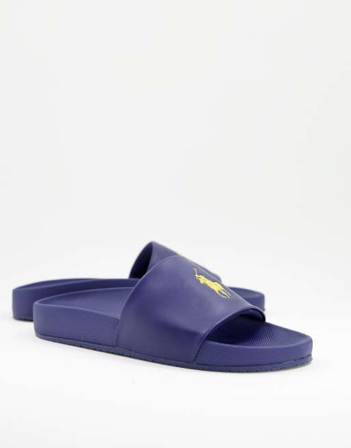 Polo Ralph Lauren sliders in navy with yellow logo