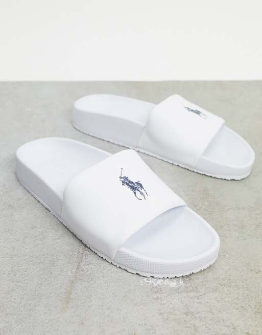 Polo Ralph Lauren Slippers in wit met marineblauw logo