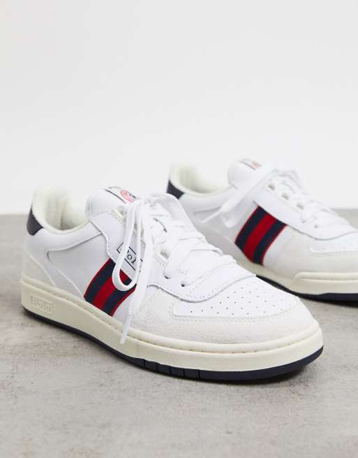 White shoes shop with red stripes