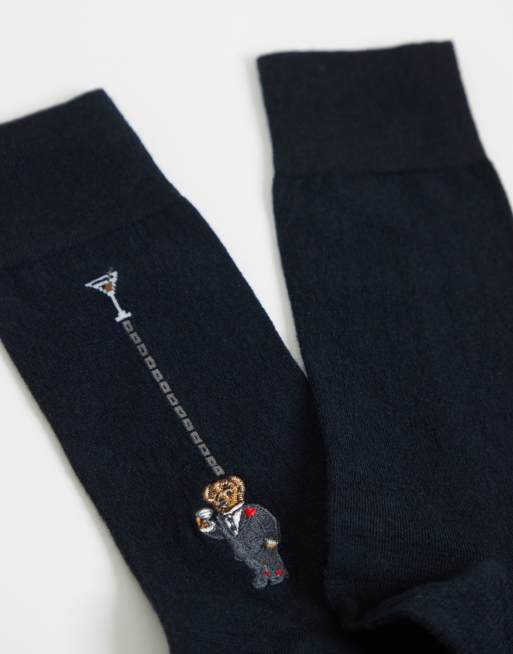 Polo Ralph Lauren sok i merinould med bjørneprint i sort, 2 af 3