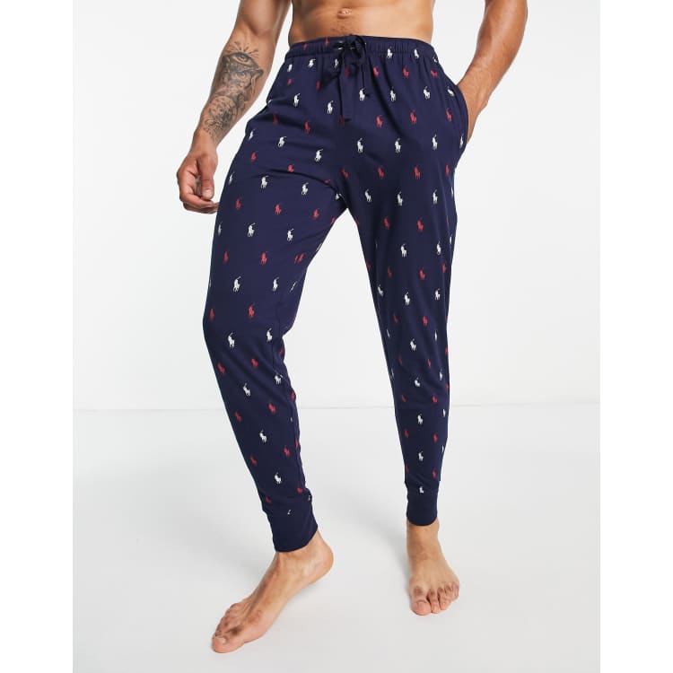 Polo Ralph Lauren sweatpants with all over pony logo in navy | ASOS