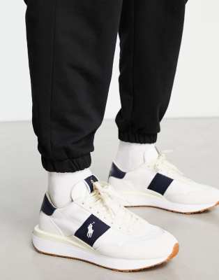  train '89 trainers in cream/navy with pony logo