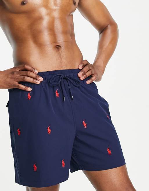 Polo shorts with store logo all over