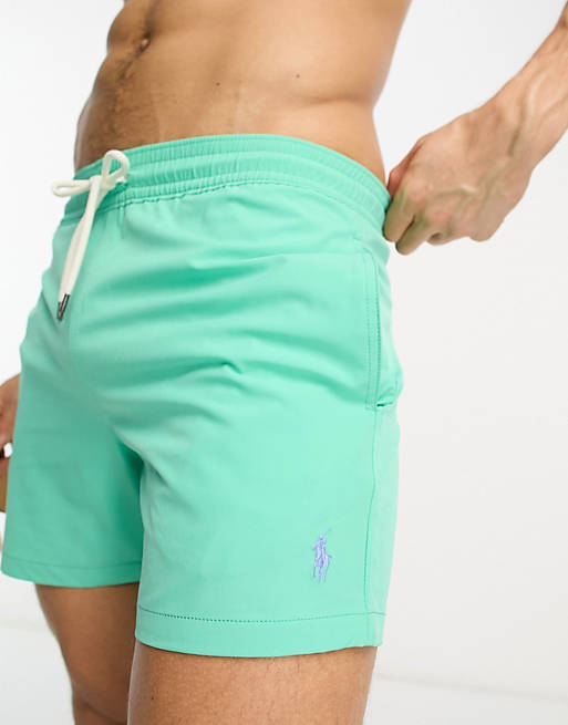 Polo Ralph Lauren Traveler slim fit icon logo mid swim shorts in light ...