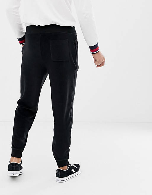 Polo Ralph Lauren velour cuffed joggers with player logo in black | ASOS
