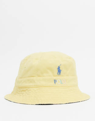 black and yellow polo hat