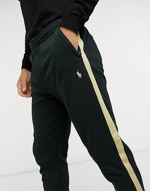 Polo Ralph Lauren x ASOS exclusive collab sweatpants in black with gold  side stripe and logo