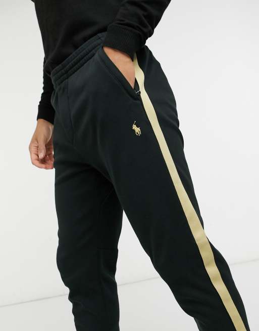 Polo Ralph Lauren x ASOS exclusive collab sweatpants in black with gold  side stripe and logo | ASOS