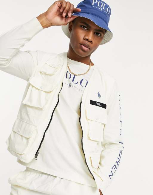 Polo Ralph Lauren x ASOS exclusive collab utility vest in cream with front  pockets with back print pony logo | ASOS