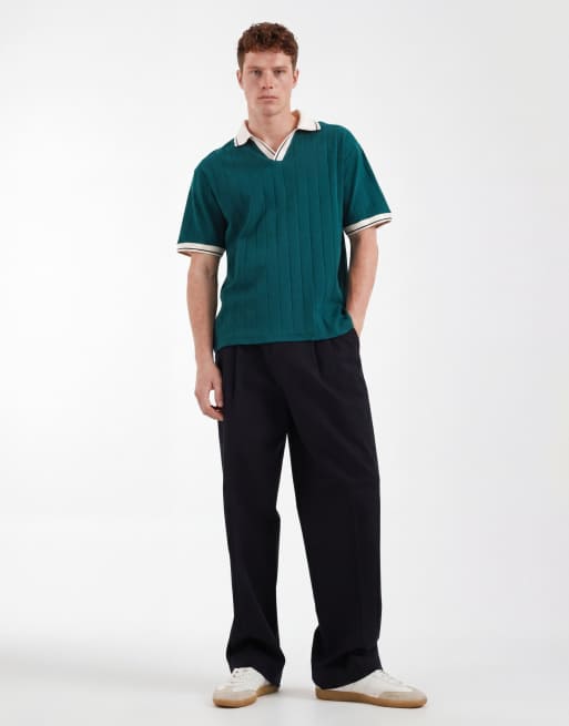 Polo verde oscuro holgado con solapas en contraste de canalé ancho de ASOS DESIGN, 2 de 5