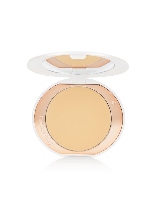 Polvos fijadores iluminadores recargables color tostado/oscuro Airbrush Brightening Flawless Finish de Charlotte Tilbury: Tono Tan/Deep