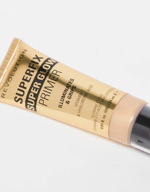 Prebase de maquillaje dorada fijadora e iluminadora Superfix Grip Superglow de Revolution, 2 de 4