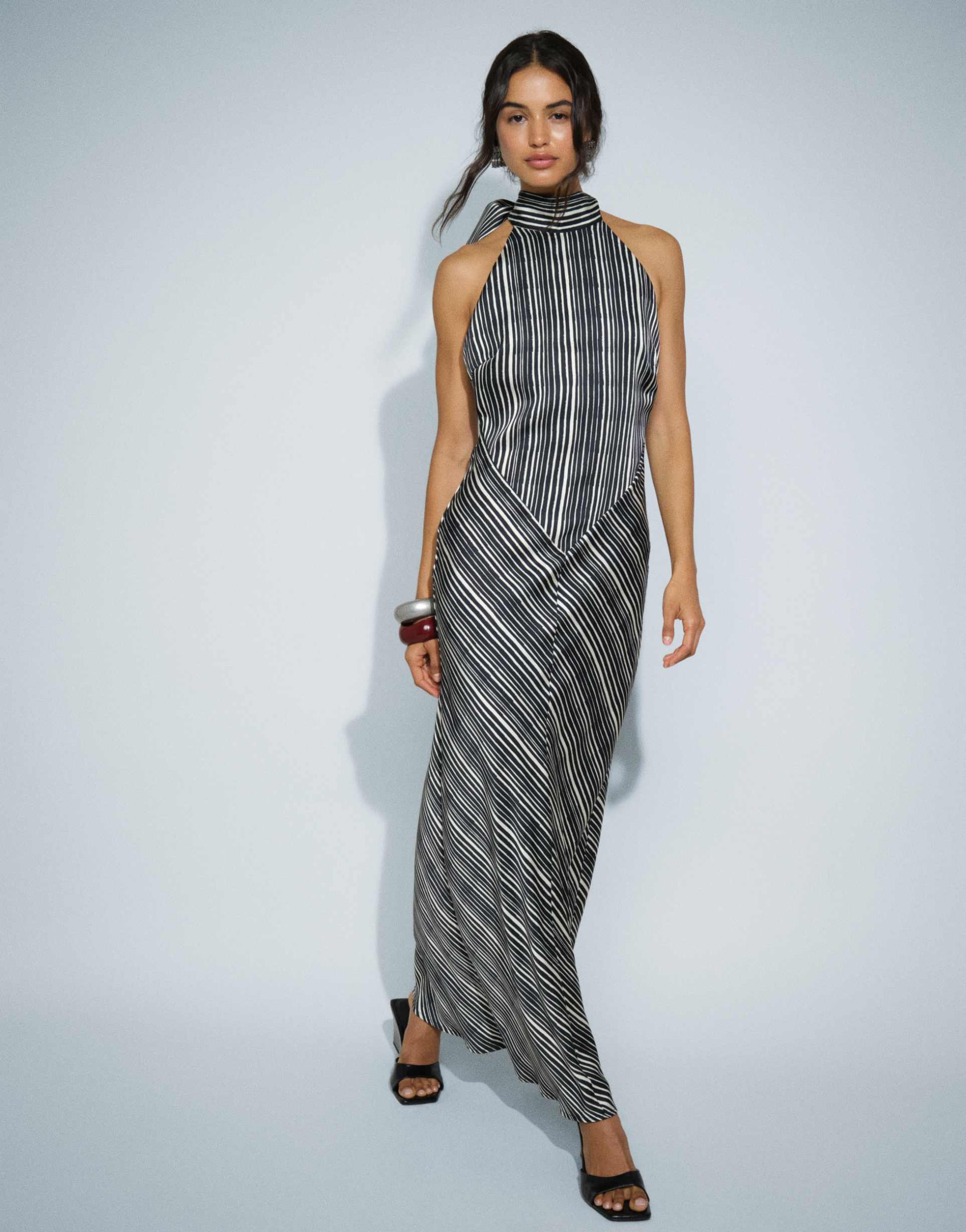 pretty lavish jemima halter neck open back maxi dress in black and cream stripes