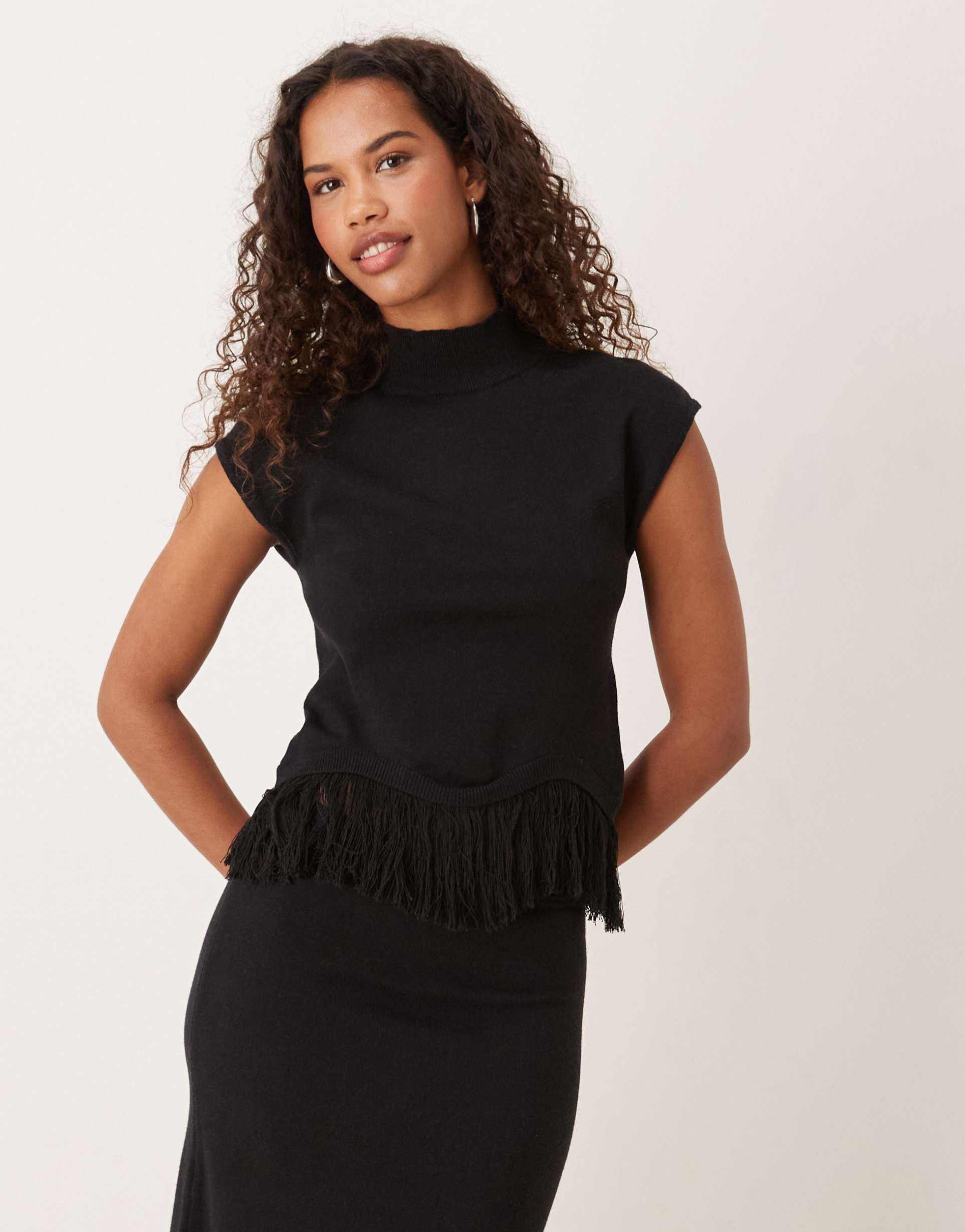 pretty lavish knit fringe hem high neck cap sleeve top in black - part of a set