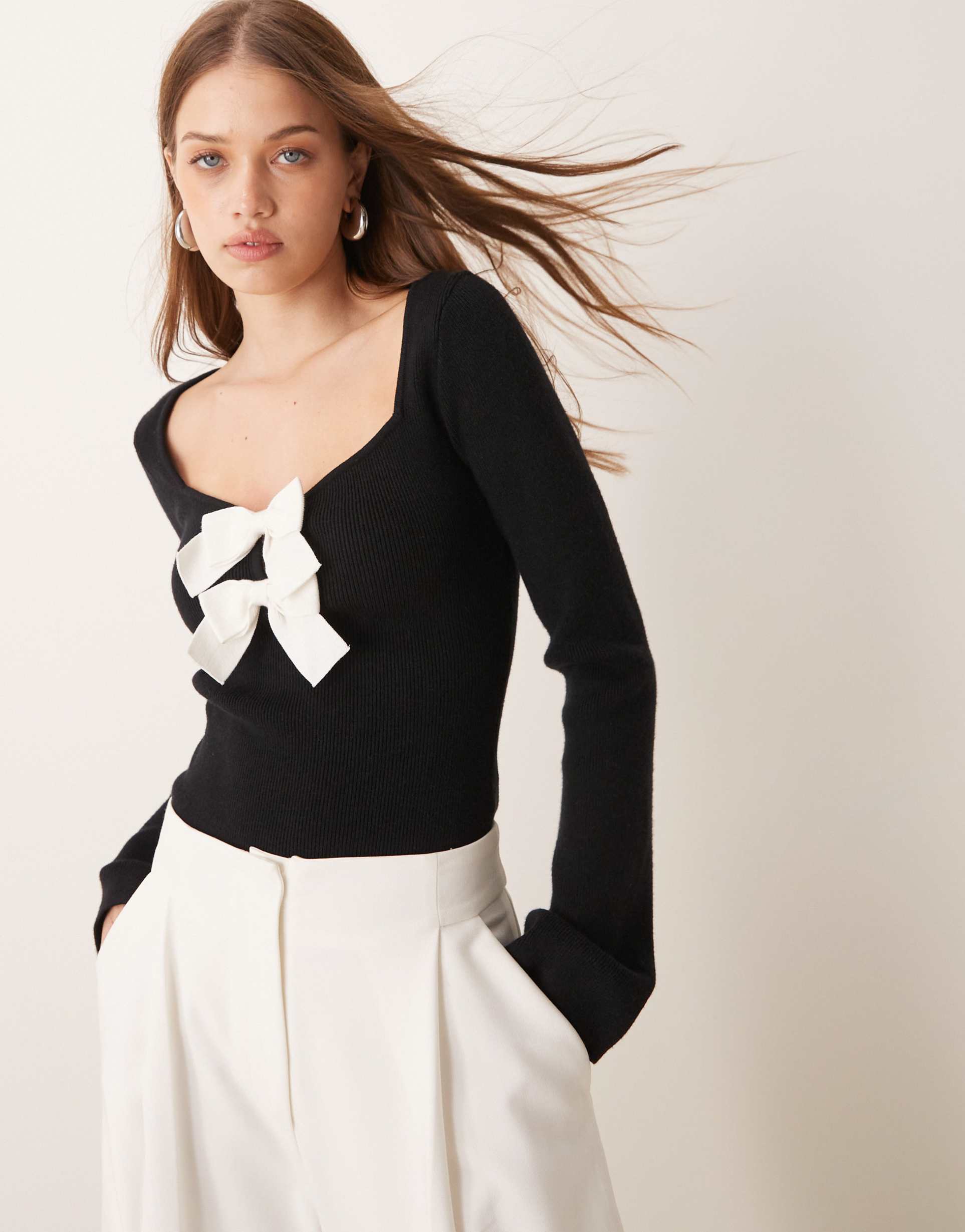 pretty lavish knitted bow detail top in mono