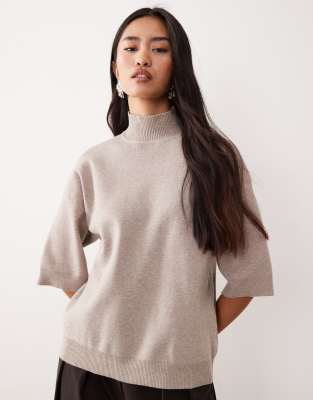 Pretty Lavish Pretty Lavish knitted roll neck cropped sleeve jumper in beige-Neutral