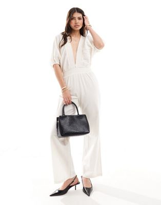 linen blend cut-out jumpsuit in cream-White