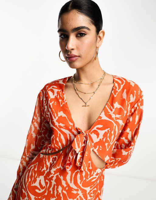 Pretty Lavish long sleeve tie midaxi dress in orange zebra