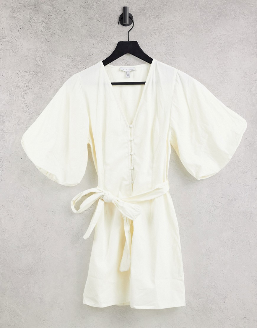 Pretty Lavish - Mini jurk met oversized mouwen en gestrikte taille in wit