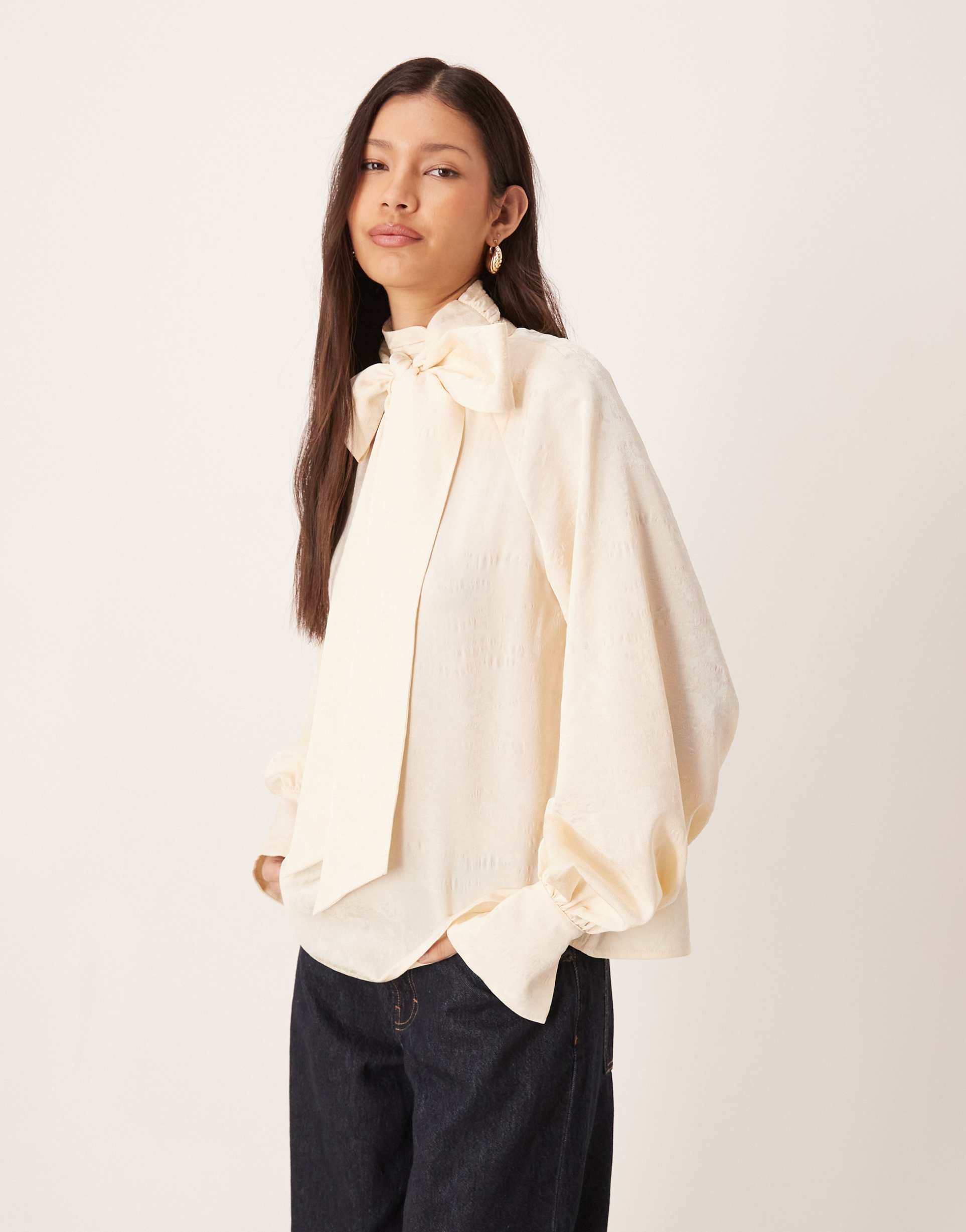 pretty lavish oversized pussybow bell sleeve blouse in cream
