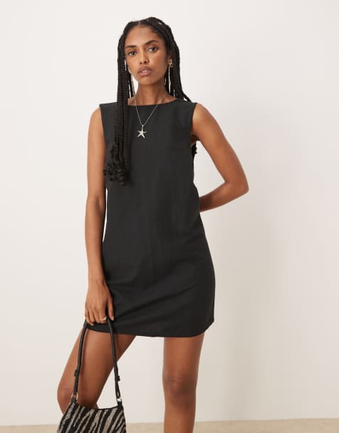 Pretty Lavish reversible button back mini shift dress in black - view 1