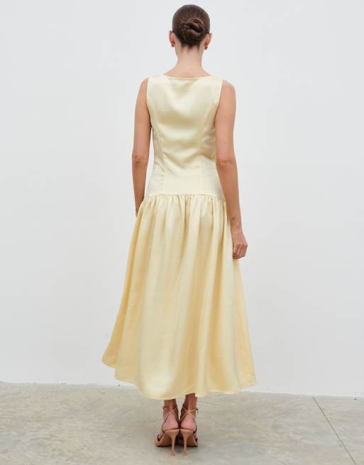 Pretty Lavish satin button down drop waist midaxi dress in lemon | ASOS