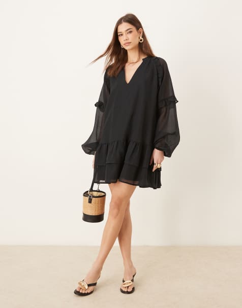 Pretty Lavish - Vestito corto a maniche lunghe nero con volant - view 1