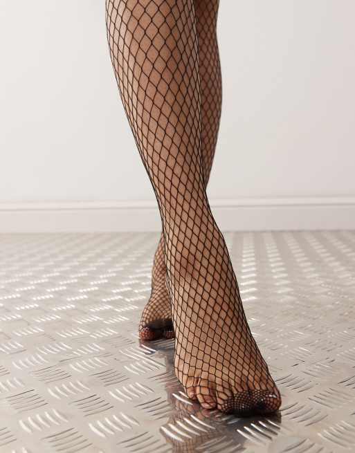 ASOS DESIGN fishnet butterfly tights in black - ShopStyle Hosiery