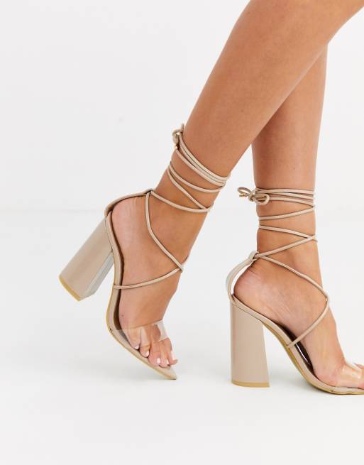 PrettyLittleThing block heeled lace up sandals with pointed toe and clear strap in nude