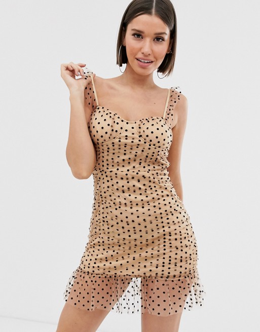 PrettyLittleThing bodycon mini dress with mesh overlay in cream with black spot