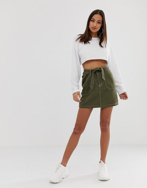 PrettyLittleThing contrast stich belted mini skirt in khaki | ASOS