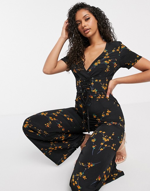 PrettyLittleThing corset detail flare jumpsuit in black floral print