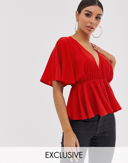 PrettyLittleThing exclusive plunge peplum top with angel sleeve in red