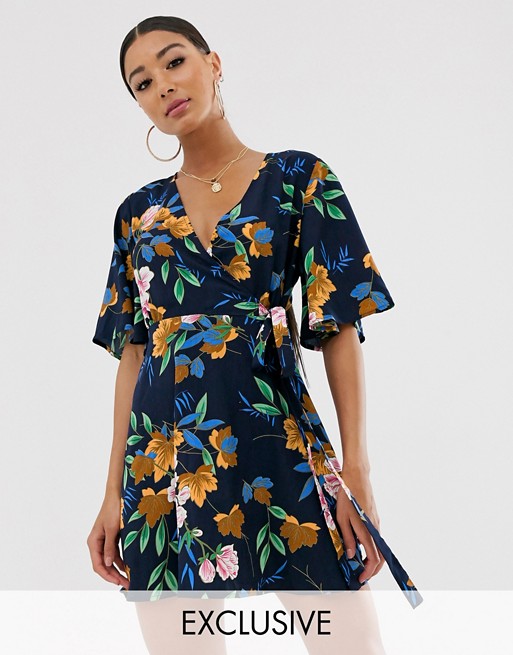 PrettyLittleThing exclusive wrap skater dress in navy floral