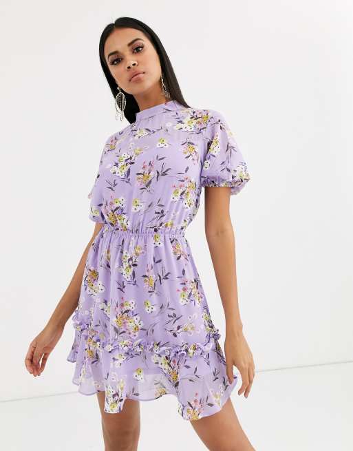 PrettyLittleThing high neck skater dress with ruffle detail in lilac ditsy floral