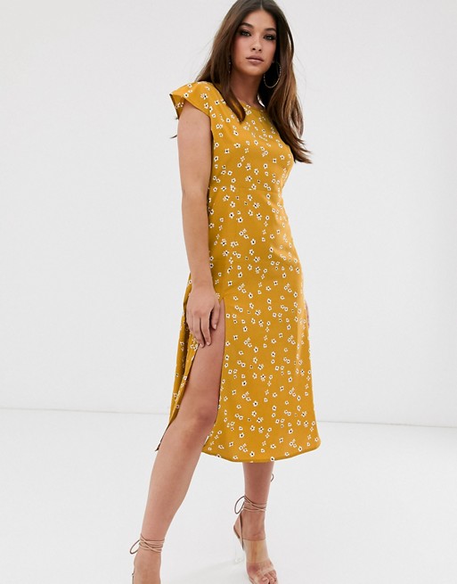 PrettyLittleThing midi dress with open back in mustard floral