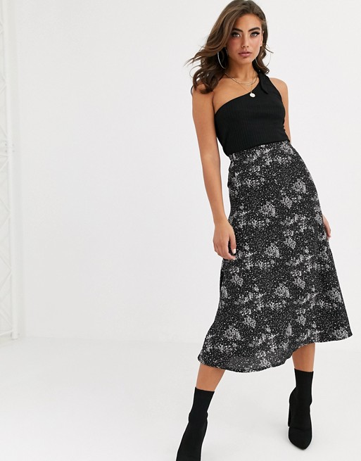 PrettyLittleThing midi pleated skirt in black floral