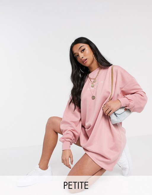 PrettyLittleThing Petite jumper dress with slogan in pink