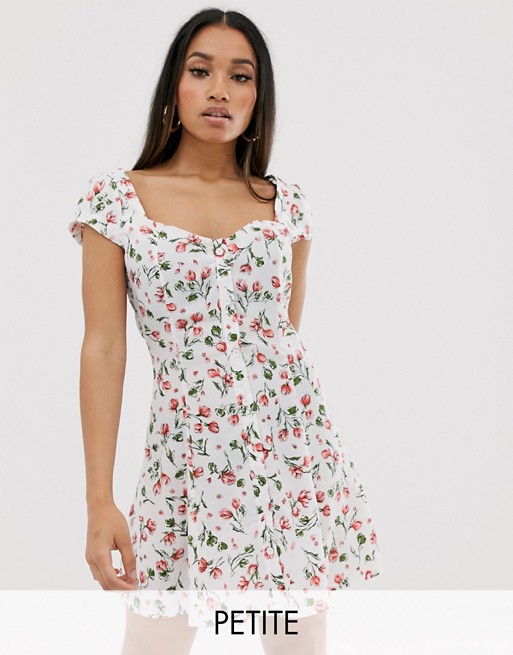 PrettyLittleThing Petite tea dress with button front in white ditsy floral